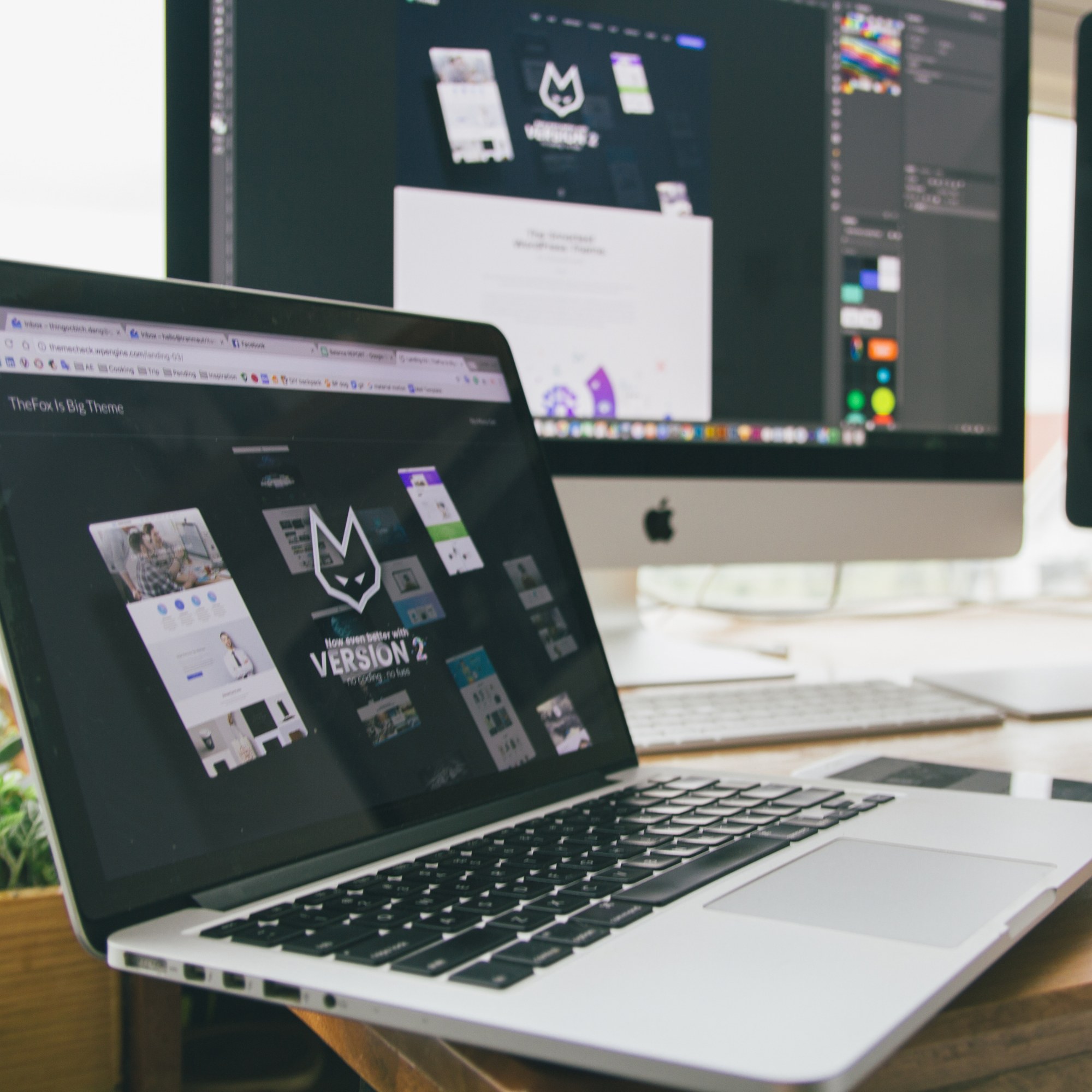 Branding — a website design on a laptop and a desktop screen